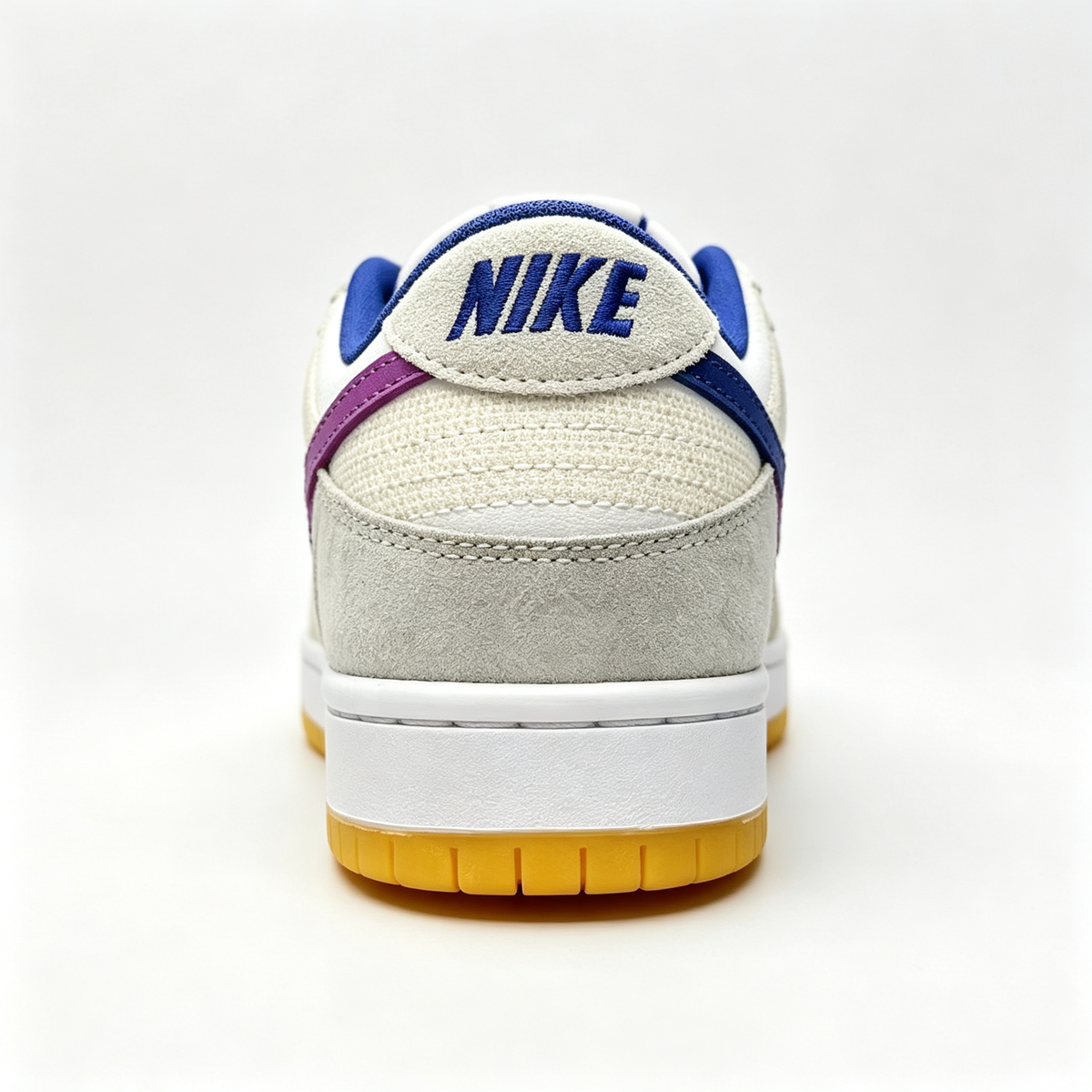 Nike Dunk Low – White/Beige Geometric Print with Purple Swoosh & Gum Sole