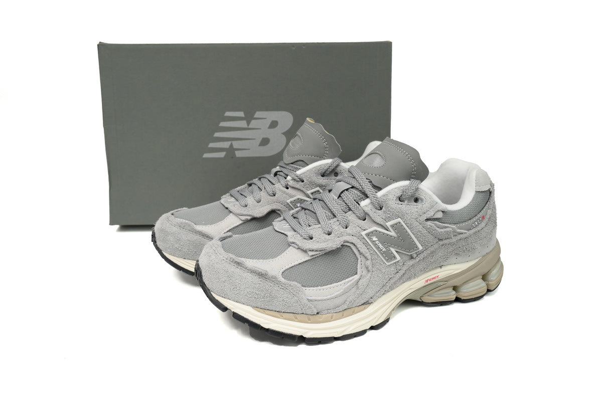 New Balance 2002R Women's & Men's Grey & Cream Distressed Retro Sneakers