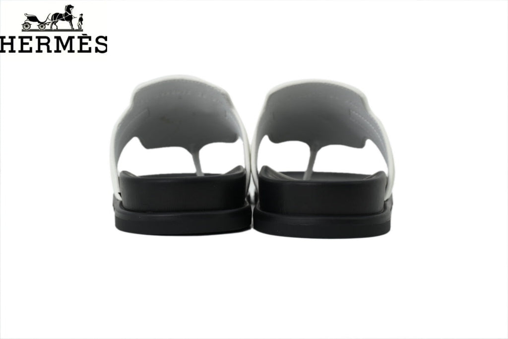 Hermès female slides White Leather Flip-Flop Slide with Metal Buckle