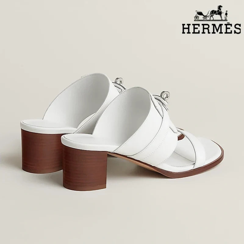 Hermès White Smooth female shoes Leather Heeled Slide Sandals with Silver Kelly Buckle