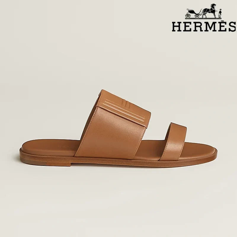 Hermès  female slides Tan Calfskin Two-Strap Flat Slide Sandals