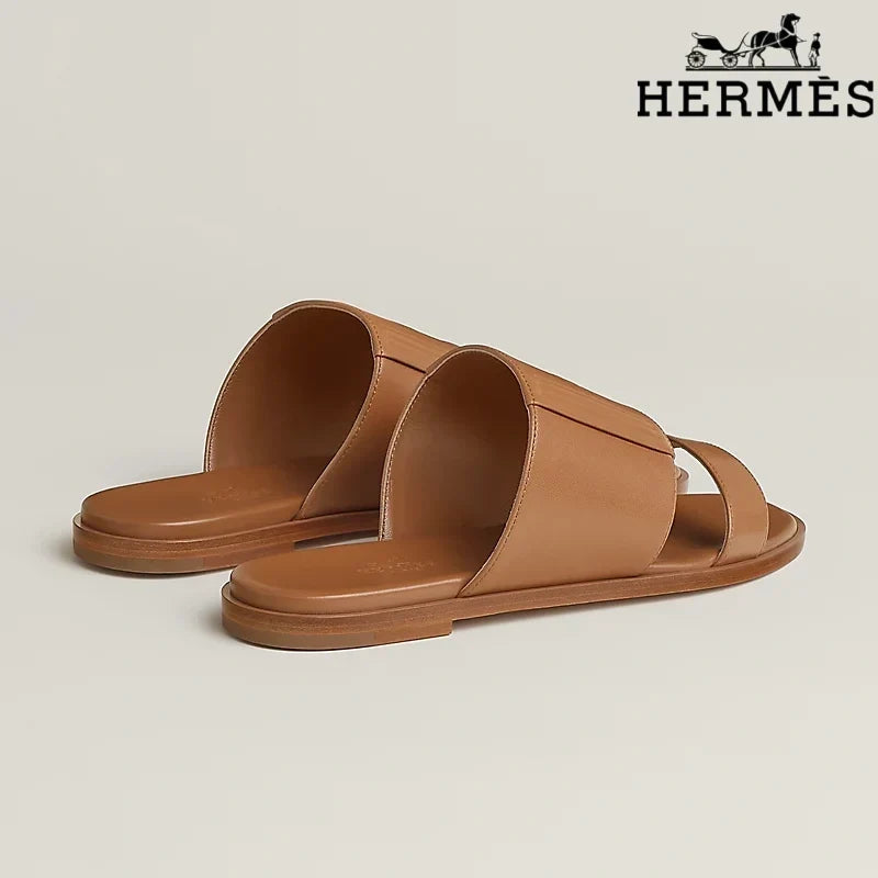Hermès  female slides Tan Calfskin Two-Strap Flat Slide Sandals