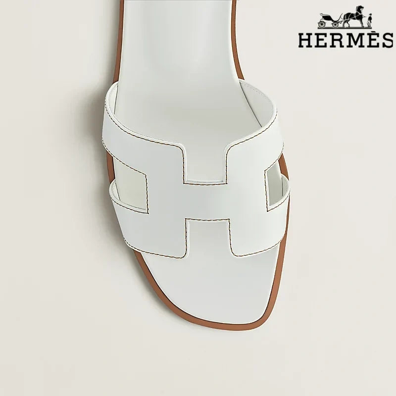 Hermès  female slides White Leather Oran Slide Sandals