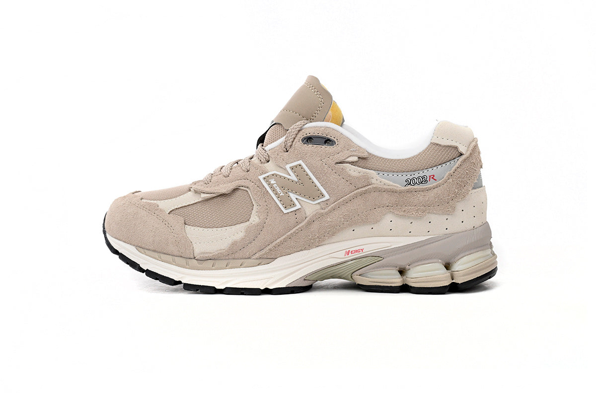 New Balance 2002R Women's & Men's Beige & Cream Distressed Retro Sneakers