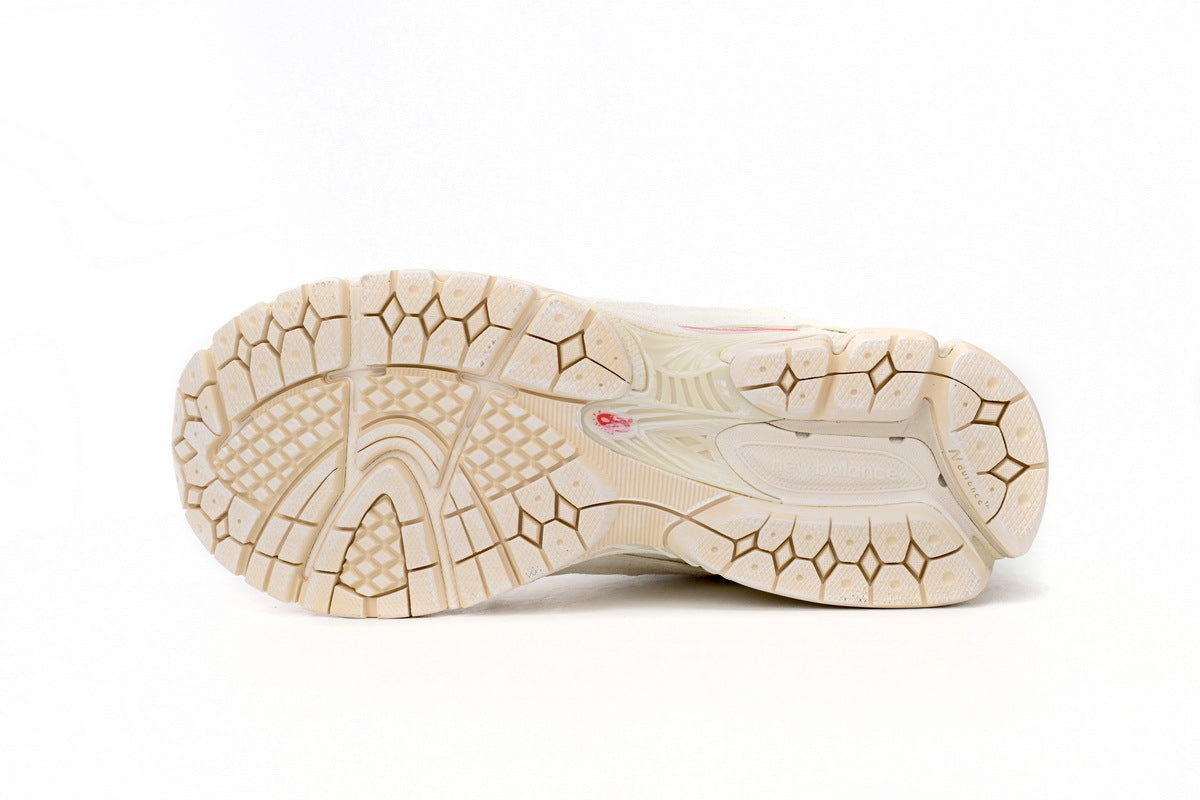 New Balance 2002R Women's & Men's Ivory Cream Distressed Retro Sneakers